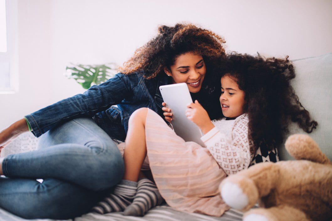 Mother and child smiling