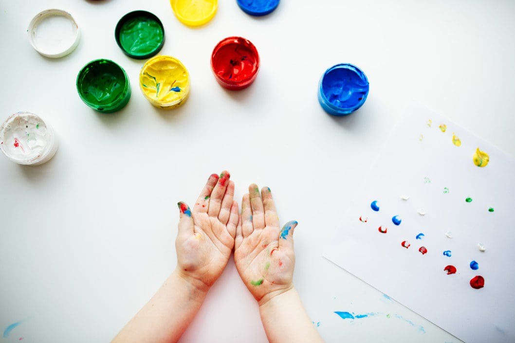Kids hands with paint