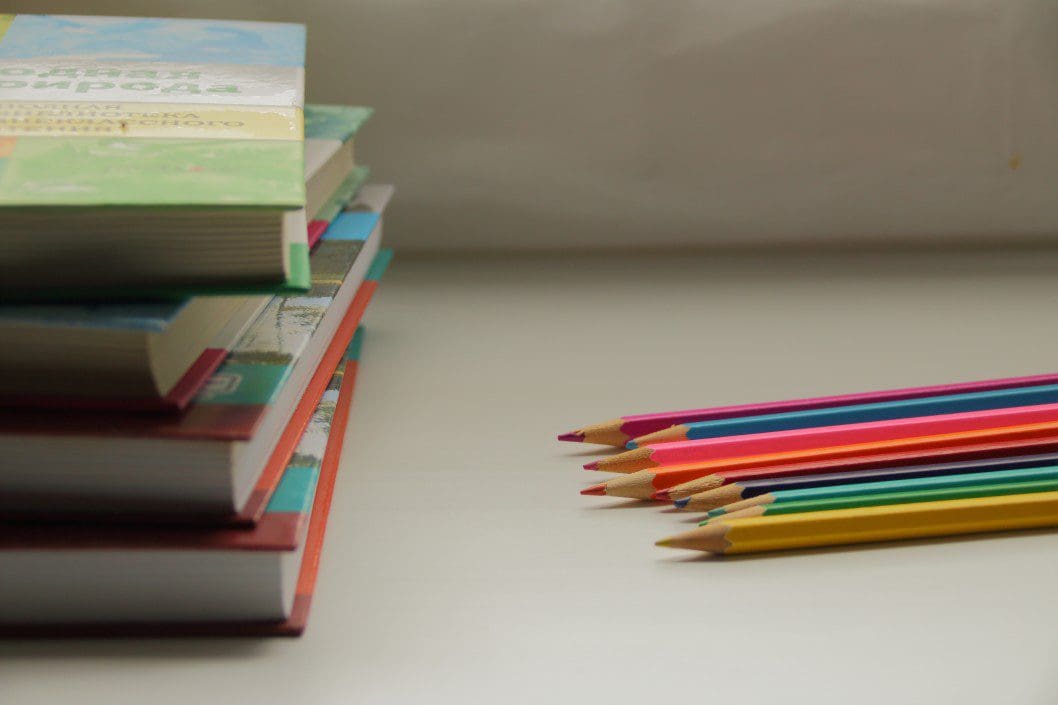 Books and colored pencils