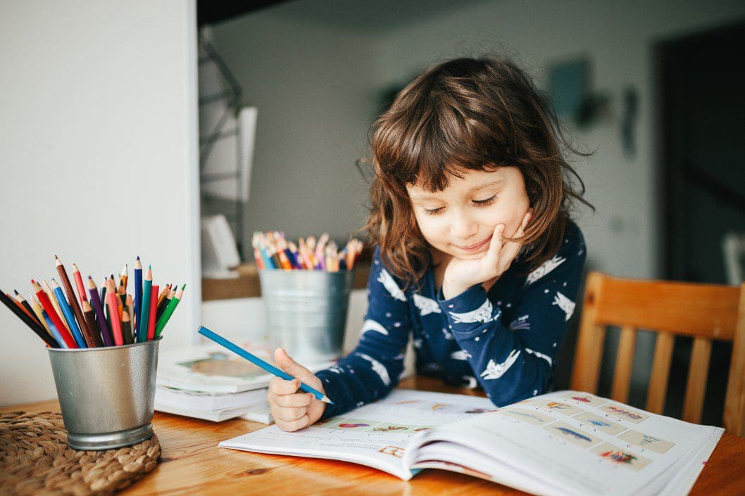 Child working on a workbook