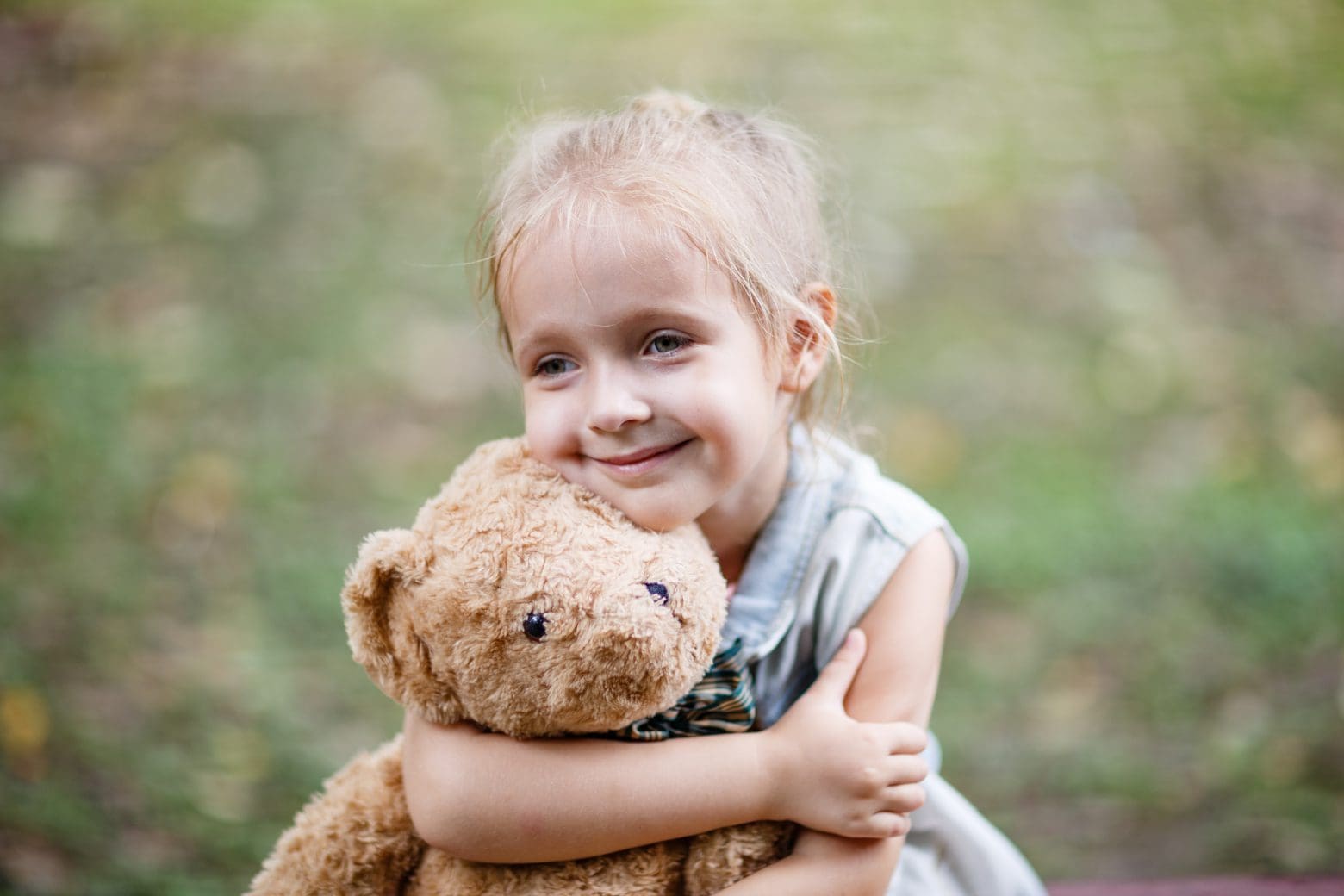 Child with teddy bear