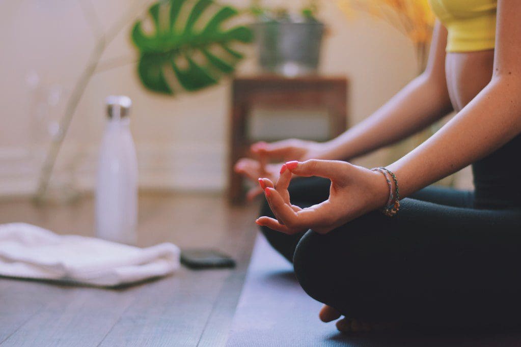 Woman meditating for mindfulness.