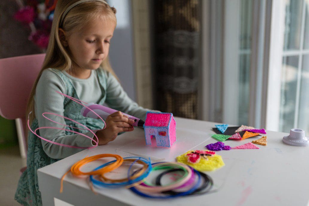 Child playing with games to work on motor skills.