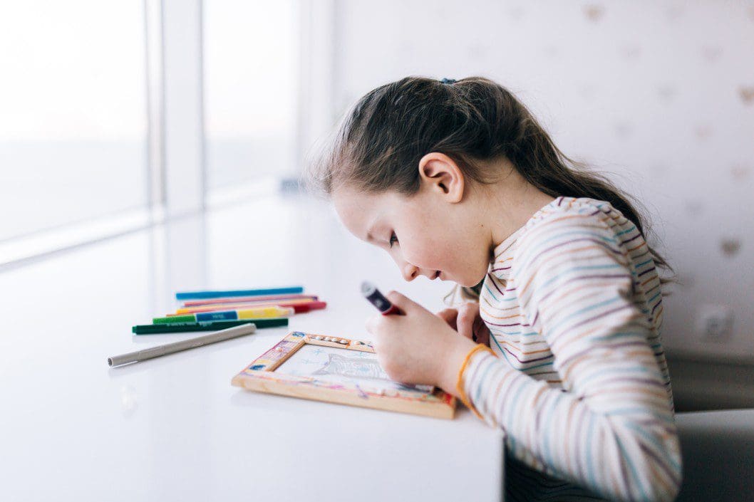 Child coloring for art therapy.