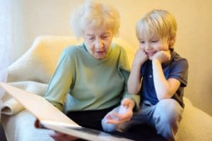 Grandmother reading to child.