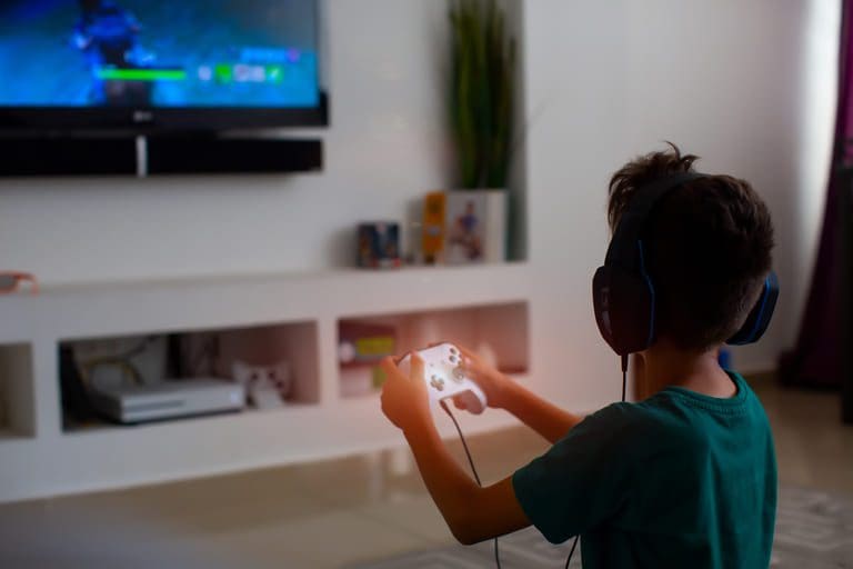 Young boy playing video games